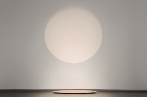 ruiard:  Germaine Kruip - Untitled Copper circle, 121.7 x 35 x 0.4 cm, reflection on wall: 150 x 150