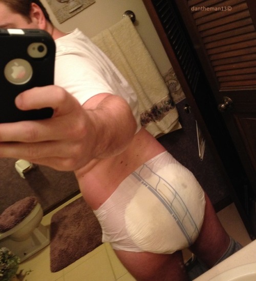 dantheman13dl:   So, I’ve never posted a photo of myself or my girlfriend so these will  be the start of hopefully more to come! Diaper peeking out…. and the  soggy butt I was hiding underneath!   