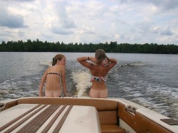 sandinmycrack:  These are REALLY my neighbors girls (yeah they are 18 and 19) having fun on their dads boat with me steering the damn thing. They love teasing just like me :)  Support me @ live camgirls