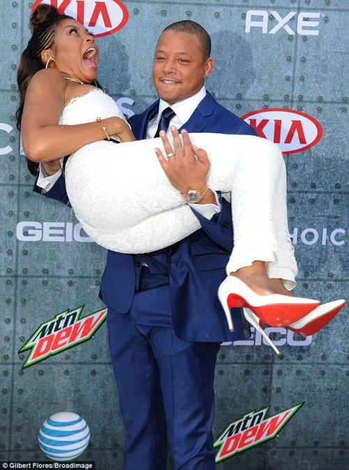 pigalle120:Taraji P Henson in Louboutins. Hilarious expression, but she looks GREAT!