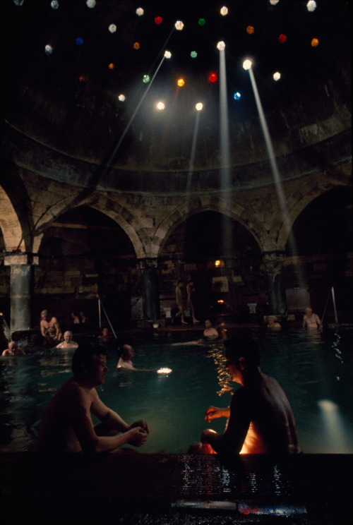 Men soak in mineral-laden hot waters of the Rudas Baths in Budapest, Hungary, April 1971.Photograph 