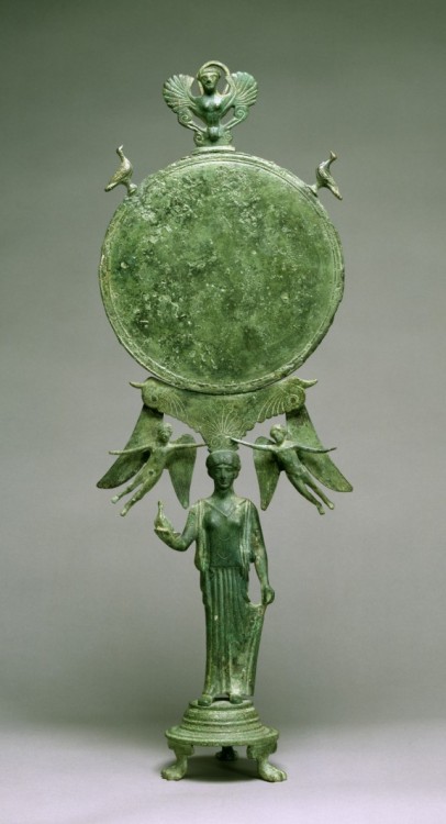 ancientpeoples:Caryatid Mirror with AphroditeGreekc. 460 BCA graceful female figure serves as a &ldq