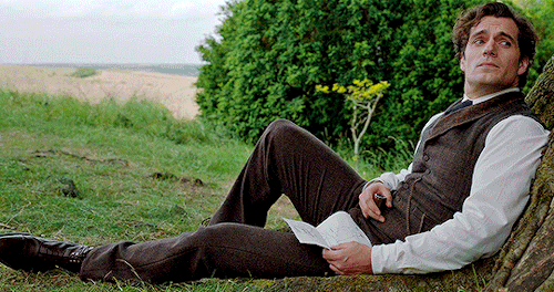 It’s Not An Enola Holmes Movie Unless Henry Cavill Attractively Lounges In A (politely) Slutty Way.