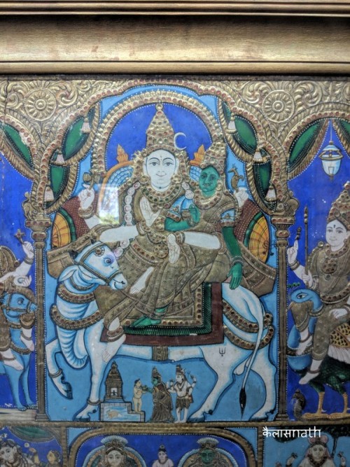 Shiva ParivarTanjore painting panel depicting Uma Maheshwara astride Nandi, flanked by Ganesha and S