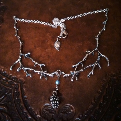 even the smallest labradorite can shine bright. this twig necklace with a labradorite bead will be f