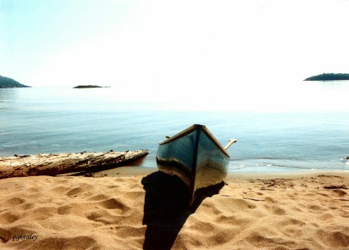 A scan of my canoe beached on the shore of Lake Superior. Memories from the 80’s.pgkealey