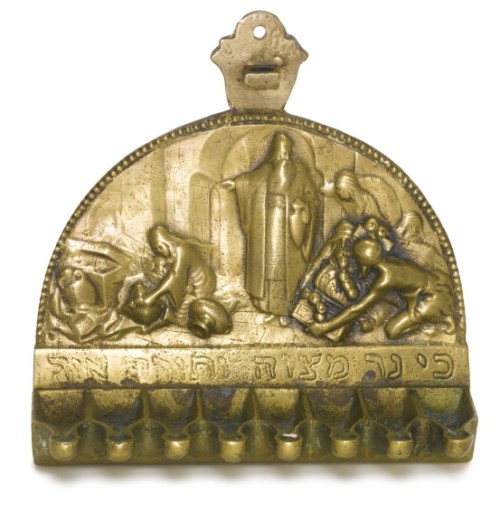 ir-hakodesh:1. Brass Hanukah lampthe openwork backplate modeled as a pair of lions holding an oval f