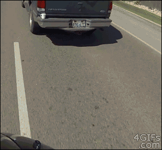 collegehumor:  Woman Forgets Mug on Bumper, Motorcyclist Hands it Back, While Driving Awesome, sure, but what if this was the way he died.
