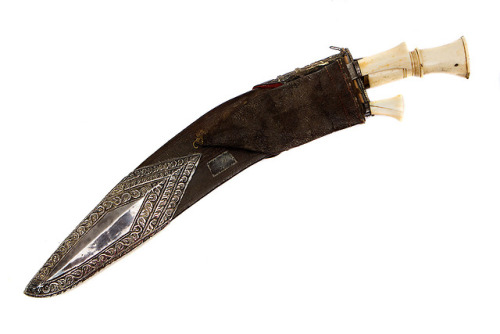 Nepalese kukri with gilt mounts and bone handle, 19th century.from Helios Auctions