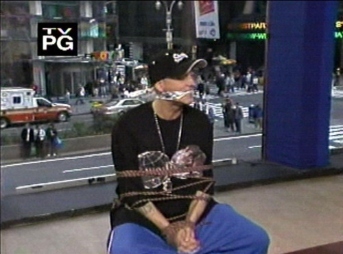 Eminem is left tied up and gagged by his D12 band mates on MTV’s TRL 27.04.04 