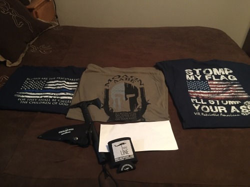Nine line order finally came, love this company! Used a promo code to get a free tomahawk with my order and they threw in a free coozie and  decal!