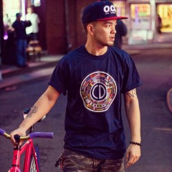 Large in the streets with @sunnyckush in navy international tee and OCD spell out snap  Allocd.com