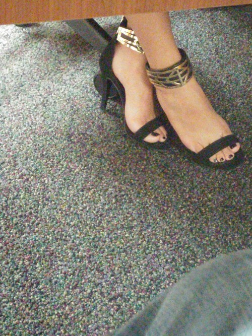 footmanx: I went to open a bank account and couldn’t resist snapping this pic! She was sexy as hell 