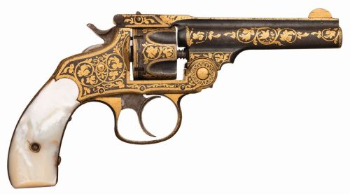 Gold damascened Spanish copy of a Smith & Wesson with pearl grips, late 19th or early 20th centu