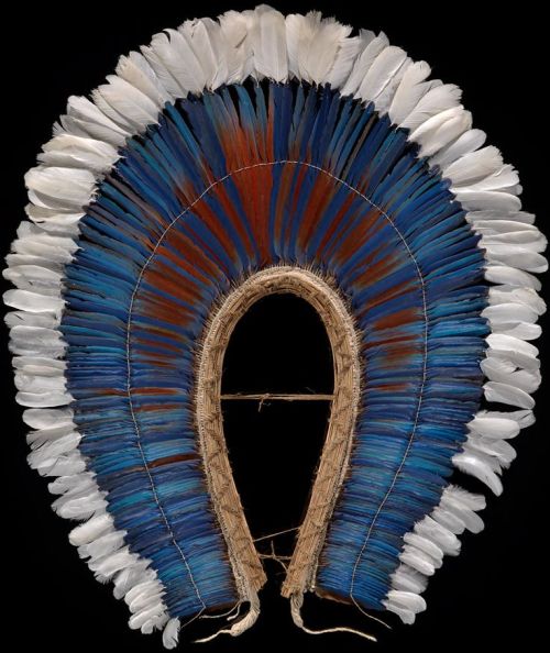 Mebêngôkre krokrokti (feather headdress or cape), Kayapo people, Macaw feathers, heron feathers, cot