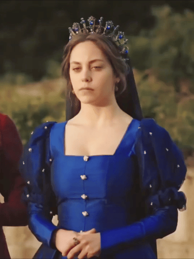 Sultans And Their Colorful Clothes + Dilruba Sultan Is Wearing A Dark Blue Caftan, Yellow Buttons And