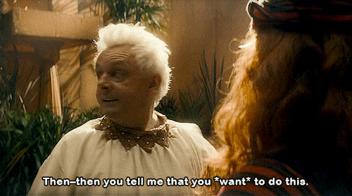Gif 1/2: Aziraphale and Crowley during the Job minisode. Aziraphale says: "Then–then you tell me that you want to do this."