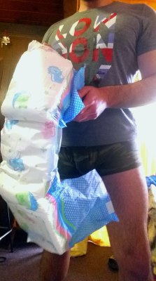 dlboyoc:  diaperunderthere:  My boyfriend said hand me a diaper. I was excited for him to be padded up. Then he told me to pull MY shorts down and lay on our bed…  Yeah…I think we’d all love this to happen.  