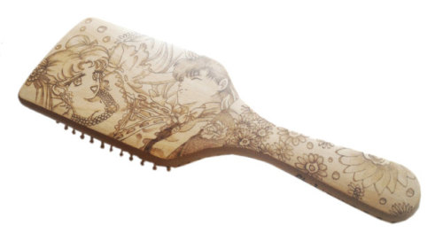 sosuperawesome:Engraved Wood Hairbrushes by Chibi Pyro Fable on Etsy