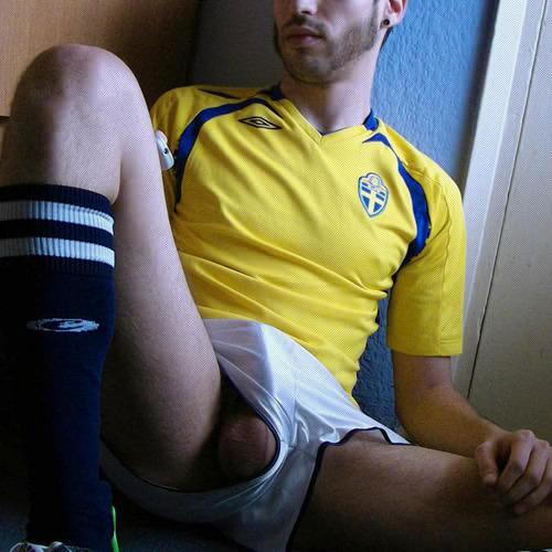shortsandunderwear:  Balls out of bulging white adidas shorts 