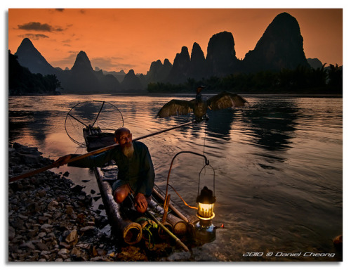 The Old Fisherman and his Cormorant [1] by DanielKHC on Flickr.