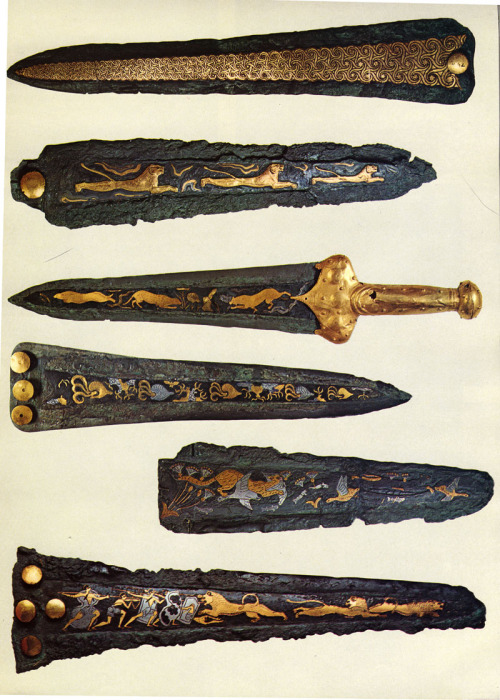coolartefact:Mycenaean daggers, made of silver and gold. Found in shaft graves 4-7 in Grave Circle A