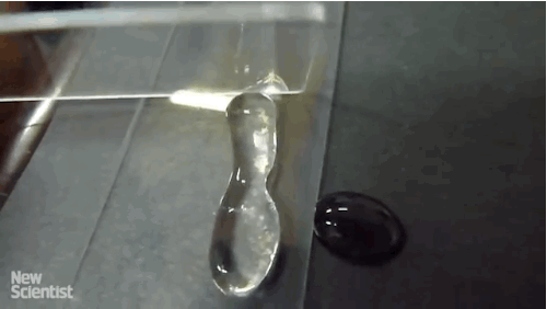 mentalflossr:  Special Nano Coating Makes Water That Can Be Shaped and SlicedScientists have figured out a way to turn liquid into a new type of material that can be sliced and molded into different shapes. In the video above, from New Scientist, the