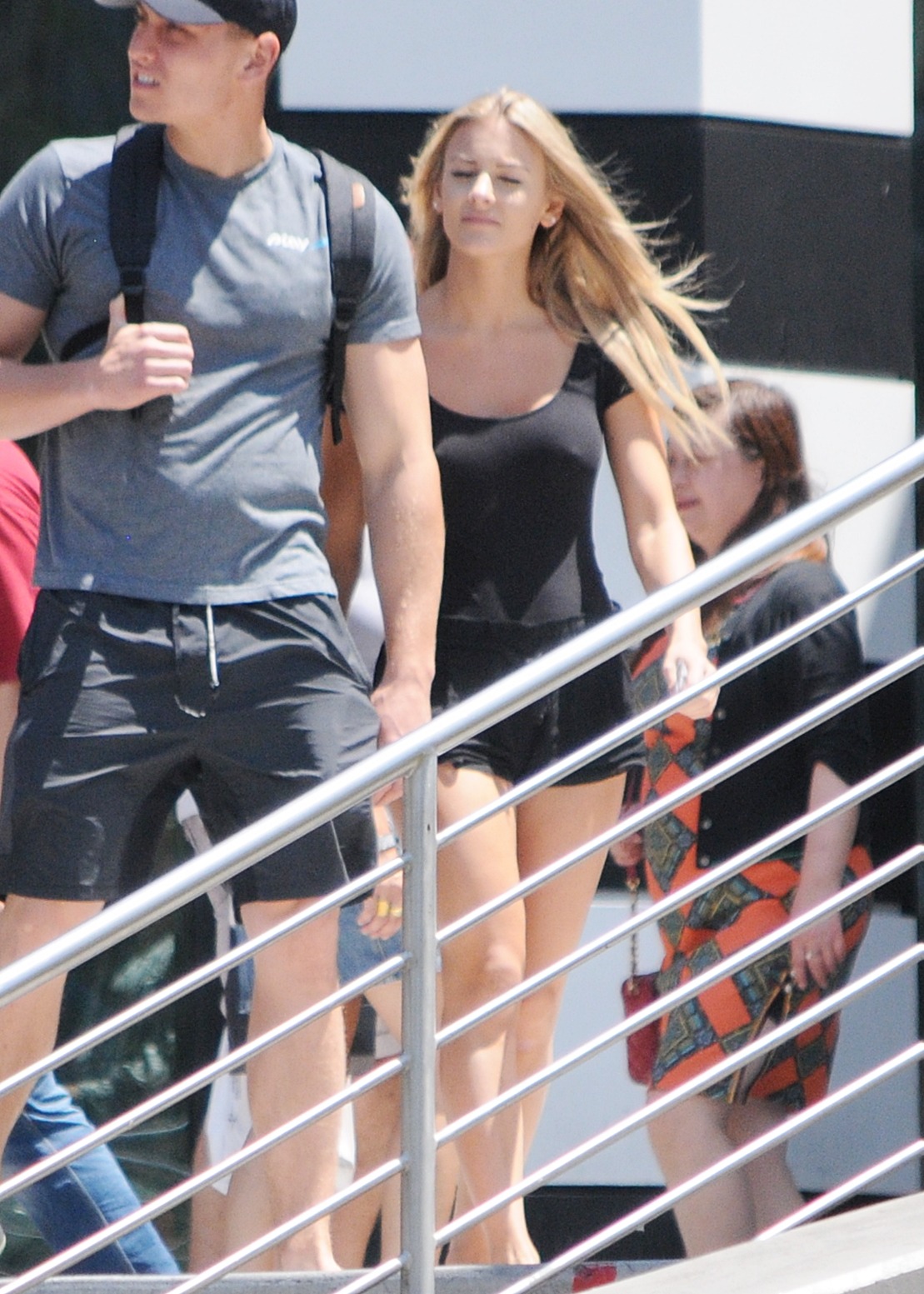 I actually did get a few shots of her before she disappeared behind her boyfriend.