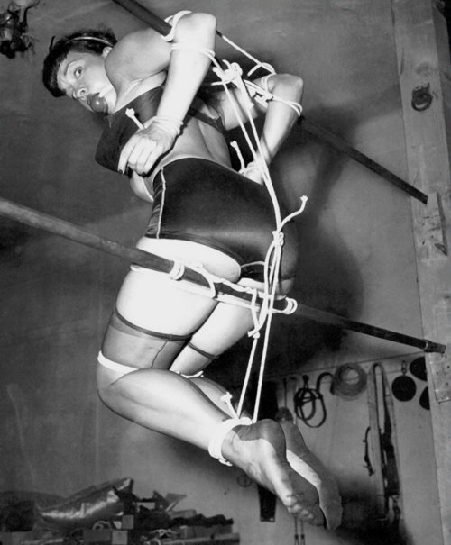 Bettie Page in bondage