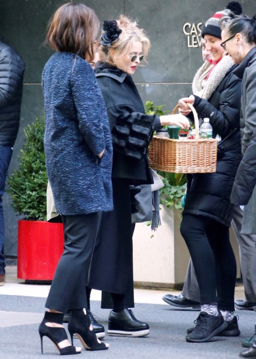 madammn:Helena Bonham Carter feeding her multiple drinks obsession with a basket of drinks all to 