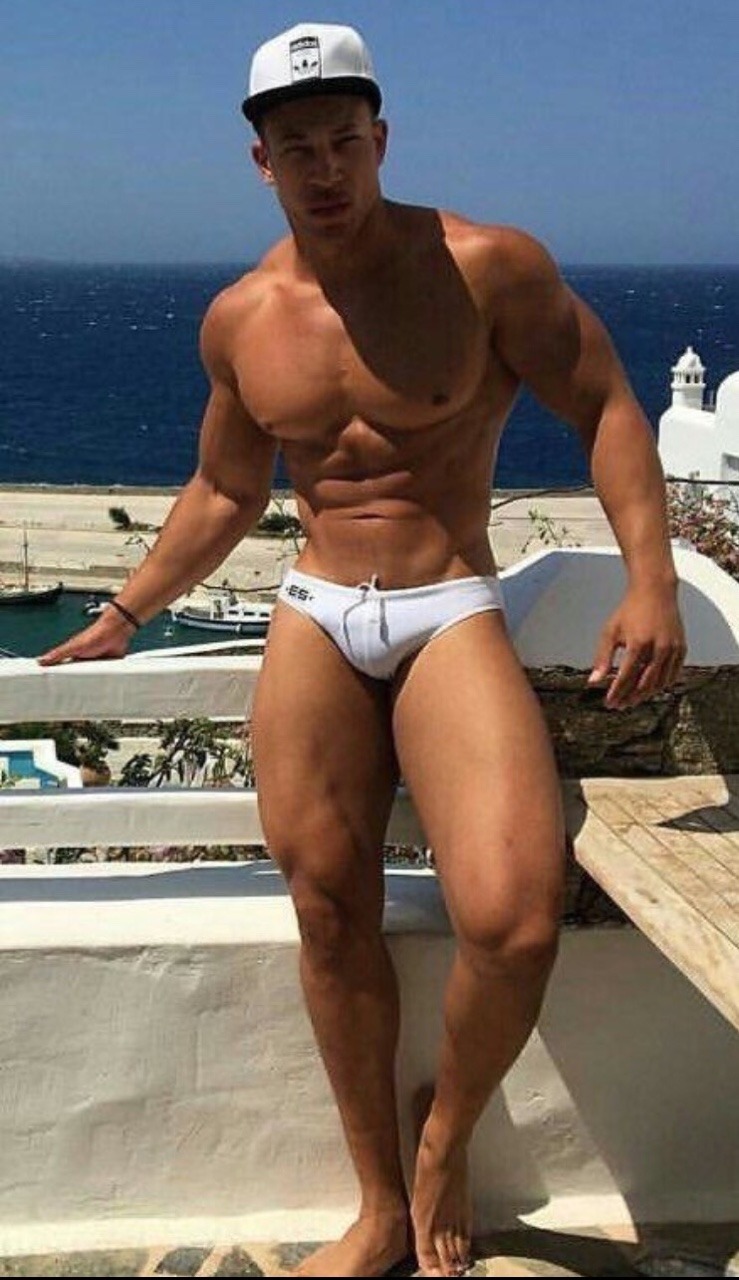 randy9bis:Muscular, and beautiful in his brief ES white swimsuit !  :-}