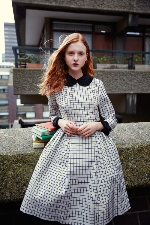 Madison Stubbington with books in fashion by Irish designer Orla Kiely in Kiely’s fall-winter 2015 c