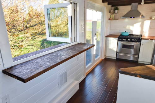 litbugi:This tiny home exudes spaces and has some great features such as a double sink in the bathroom, double loft space, lots of windows, and a washer/dryer unit: http://tinyhouseswoon.com/custom-tiny-living-home/