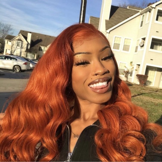 jojordan:       auburn hair on brown skin  