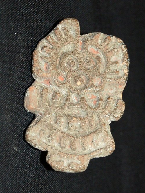 Two Aztecpottery body stamps (Post-Classic, Texcoco, Mexico):Decorated withan abstract human-like fi