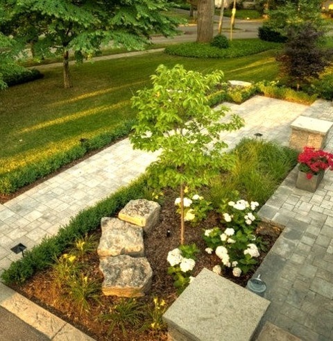 Front Yard In TorontoInspiration For A Large Contemporary Front Yard Stone Landscaping.