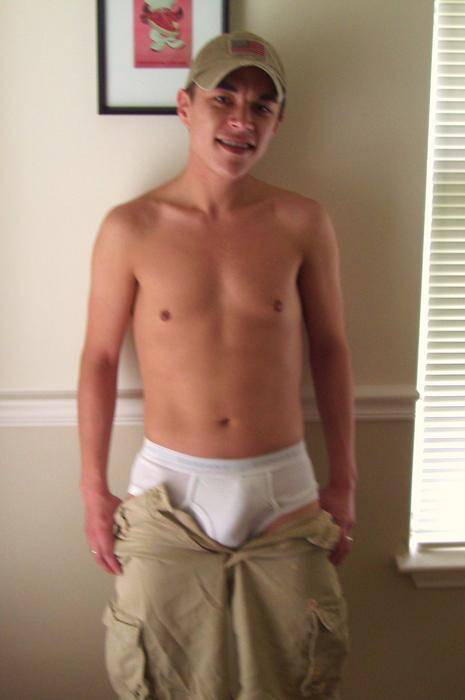 tightiewhitietwink:Taking off his shorts gets him hard in his boy briefs. 