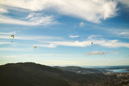 {There is nothing more fun than being rewarded at the end of a hike with the sight of paragliders ta