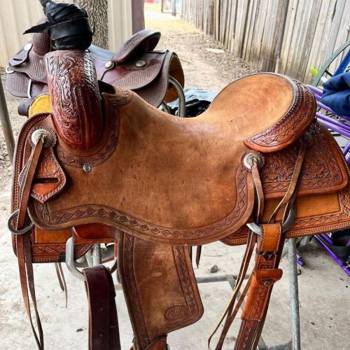 17inch NRS roping saddle like new. Very comfy, has the crooked stirrups stamped and carved, halfbree