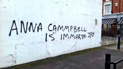 Memorial graffiti for Anna Campbell, a British anarchist who was killed by a Turkish airstrike on Ma