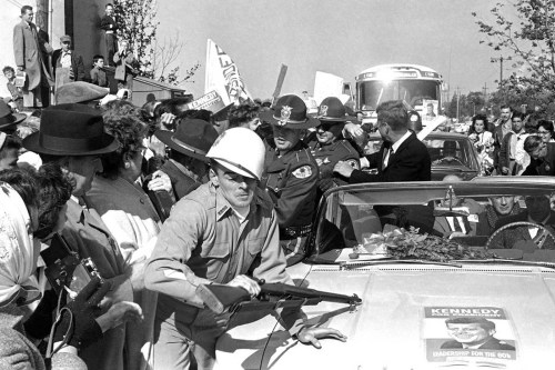 Senator John F. Kennedy is mobbed by well-wishers upon his arrival atLos Angeles International Airpo