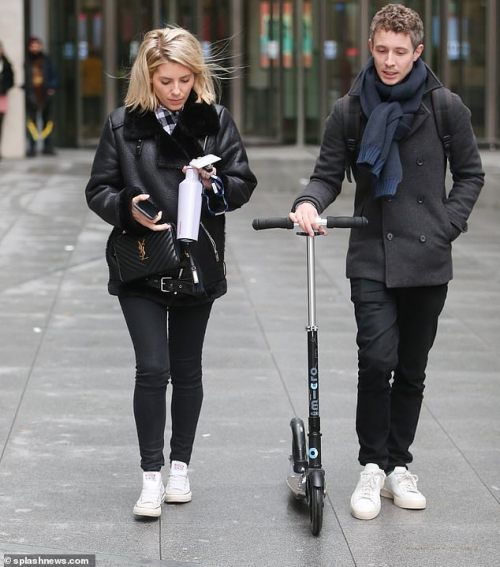 Mollie and Matt leaving the BBC Radio One studios