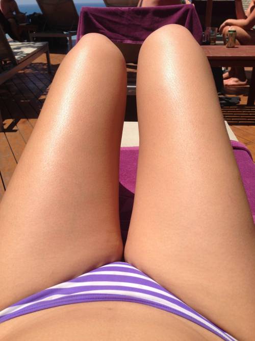 cosmicbabe91:  day 2 of poolside adventures - pt 1: legs up and ready to get my tan on.
