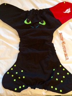 bkid-5:  Wearing a Tena slip with a paws print cloth diaper and my toothless diaper cover as requested by my bros. 