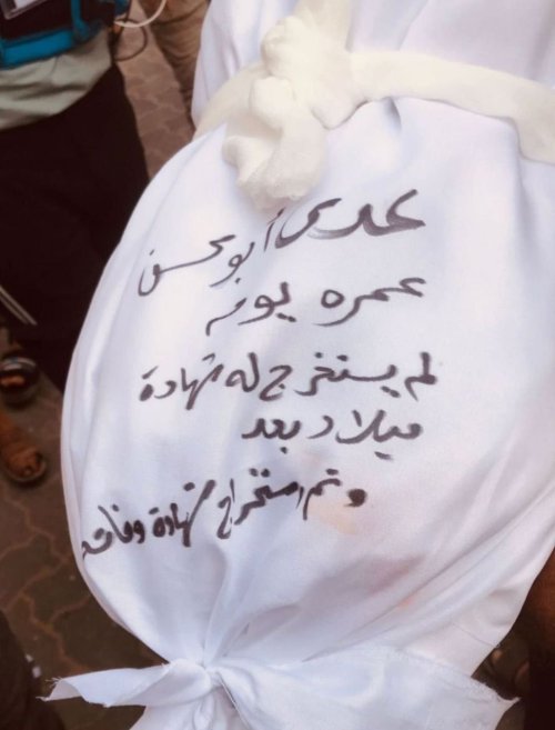 The Picture Shows A Bag Containing A Body Or Remains, And It Is Labeled: "Oday Abu Mohsen (or Maybe Hasan),