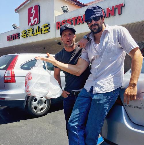 May 1st: Scott with a friend at the Elite Restaurant in Los Angeles.{c}