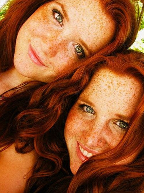 Girl with red hair freckles green eyes