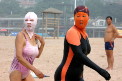 Chinese women topping burkini wearing women