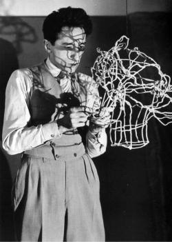 24hoursinthelifeofawoman:  Jean Cocteau sculpting his own head.