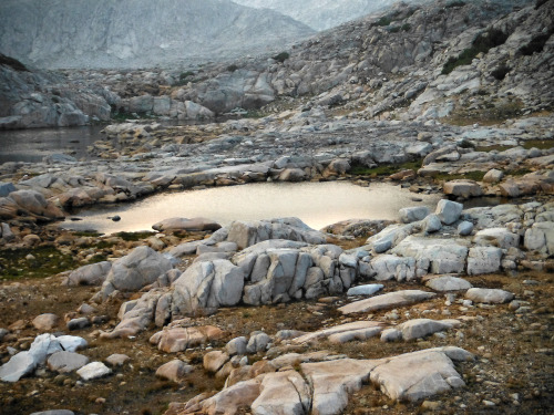 The smoke adds a surreal, muted light to the landscape. Pinnacles Lakes Basin, John Muir Wilderness,